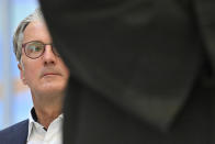 Rupert Stadler, the long-time head of Audi, who is accused of fraud, among other things, at the Munich Regional Court, Munich, Germany, Wednesday, Sept.30, 2020. Five years after the VW diesel scandal was uncovered, the first German criminal trial in this matter is now beginning. With the former Chairman of the Board of Management of Audi AG Stadler and the former member of the Board of Management of Porsche Hatz, two former leading Audi engineers are also accused. The trial is taking place under difficult conditions in a large hall at the Munich-Stadelheim prison on account of Corona. (Peter Kneffel/dpa via AP)