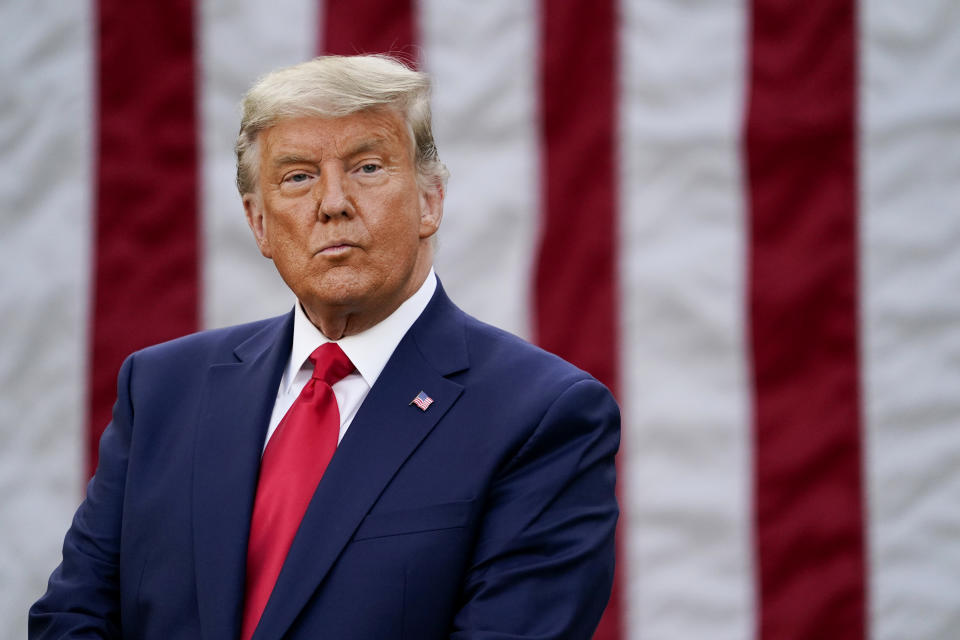 President Trump listens during an event on Operation Warp Speed in the Rose Garden of the White House. (Evan Vucci/AP)