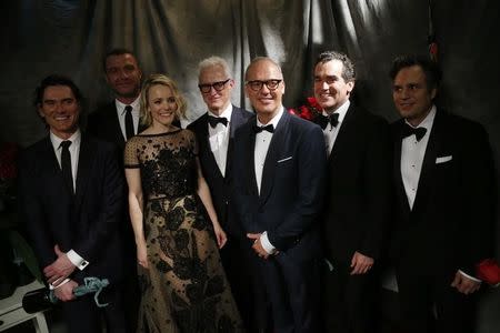 Actors Billy Crudup, Liev Schreiber, Rachel McAdams, John Slattery, Michael Keaton, Brian d'Arcy James and Mark Ruffalo (L to R) pose backstage with their award for Outstanding Performance in a Motion Picture for the film "Spotlight" at the 22nd Screen Actors Guild Awards in Los Angeles, California January 30, 2016. REUTERS/Mario Anzuoni