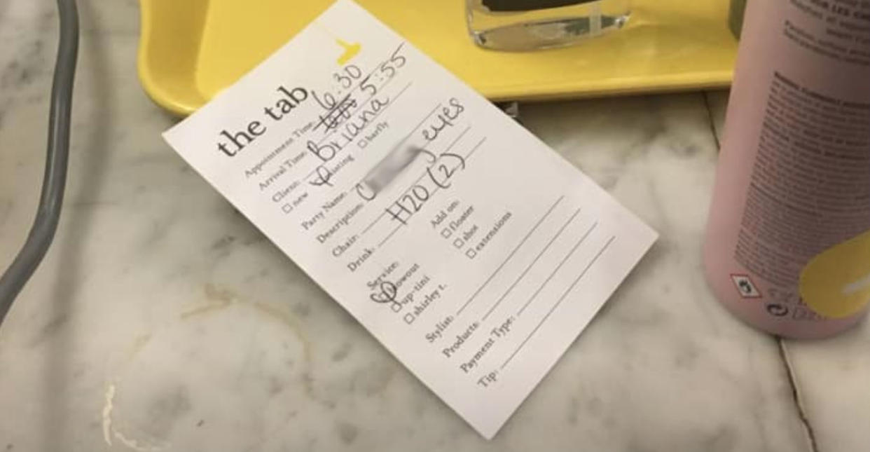 Briana Tae shared on Facebook a picture of her receipt, featuring a racial slur describing her, from a Manhattan Drybar. (Photo: Facebook)