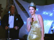 <p>Though she ends up stealing the crown from Rachael, Jode Lyn O’Keefe, who plays Taylor Vaughan, looks great in her gold crushed-velvet halter dress. Earlier in the evening, she also led the most epic prom dance scene in history. (Photo: Miramax Films) </p>