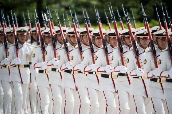 A Japanese Self Defense Forces (SDF) honor guard marches before the inspection by Japan's Prime Minister Shinzo Abe at the Ministry of Defense on Sept. 17, 2019 in Tokyo, Japan.<span class="copyright">Tomohiro Ohsumi—Getty Images</span>