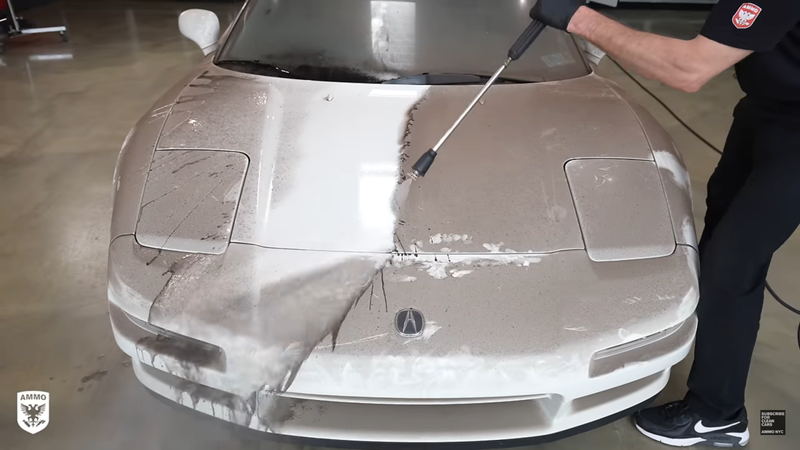 This is what it’s like cleaning 20 years of grime off an old car. - Screenshot: Ammo NYC via YouTube
