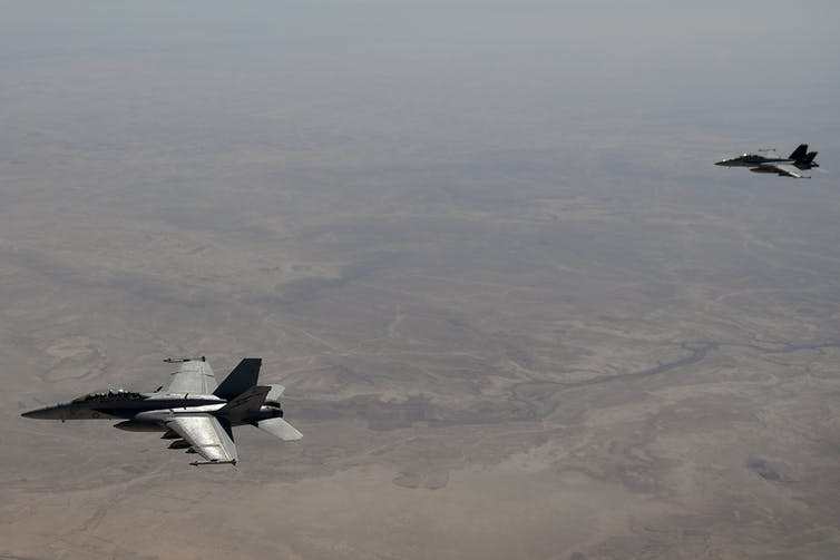 <span class="caption">Australian Super Hornets over Iraq.</span> <span class="attribution"><span class="source">EPA</span></span>