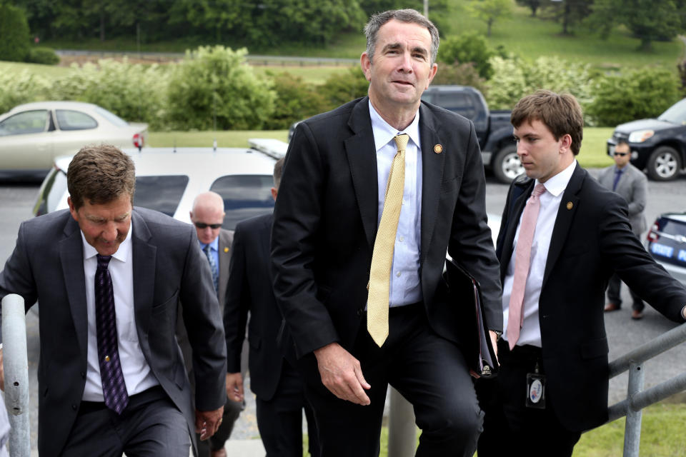 Virginia Gov. Ralph Northam arrives at Virginia Tech's Alson H. Smith Jr. Agricultural Research and Extension Center in Frederick County, Va., for a tour of the facility, Thursday, May 23, 2019. The mystery of whether Northam was in the racist yearbook photo that upended Virginia politics may never be solved, but one thing is clear: The governor has survived what many initially thought was a fatal blow and has managed to return to something resembling normal. (Jeff Taylor/The Winchester Star via AP)