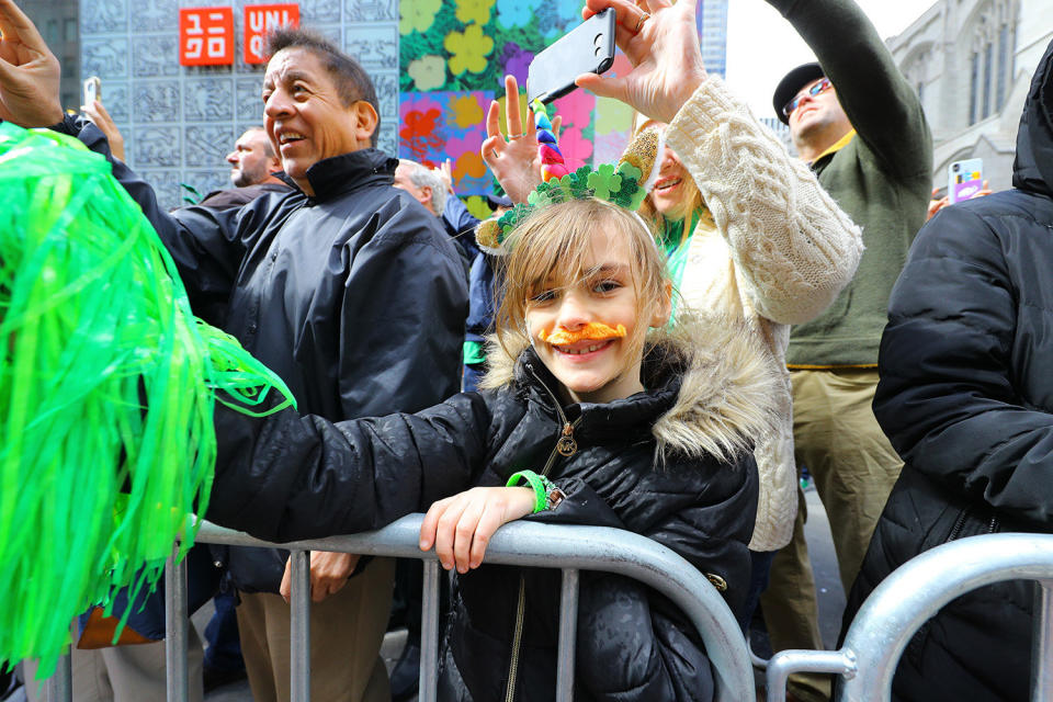 Crowds along Fifth Ave. are dressed fashionably green in clothing for the St. Patrick's Day Parade, March 16, 2019 in New York. (Photo: Gordon Donovan/Yahoo News)