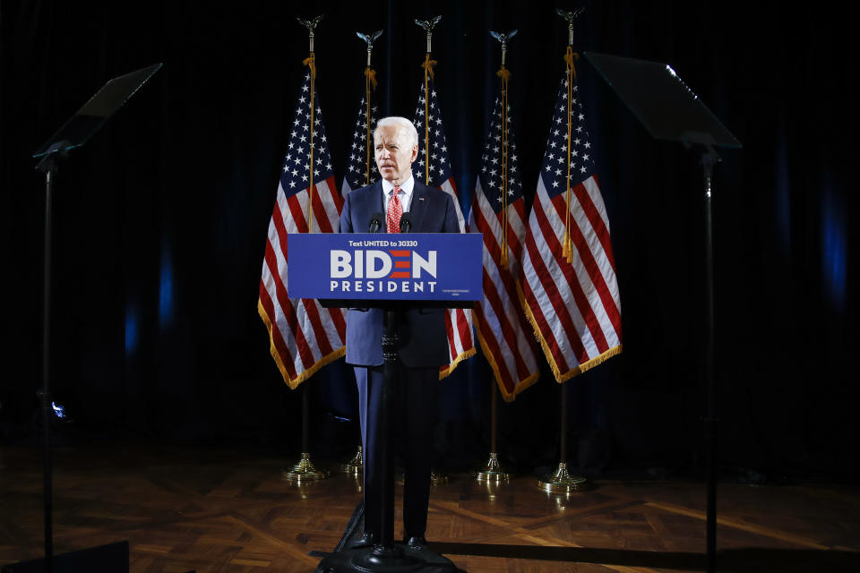 FILE - In this March 12, 2020, file photo Democratic presidential candidate former Vice President Joe Biden speaks about the coronavirus in Wilmington, Del. Biden is the presumptive Democratic nominee. But the process of making it official is anything but settled. (AP Photo/Matt Rourke, File)