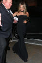 <p>Jennifer Aniston arrived at the engagement party for Gwyneth Paltrow and her Hollywood producer fiancé, Brad Falchuk, wearing a floor length black gown with choker detail. </p>
