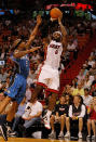 MIAMI, FL - DECEMBER 18: LeBron James #6 of the Miami Heat shoots over Quentin Richardson #5 of the Orlando Magic during a preseason game at American Airlines Arena on December 18, 2011 in Miami, Florida. (Photo by Mike Ehrmann/Getty Images)