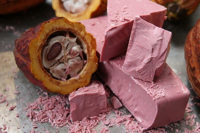 Ruby chocolate made by the&nbsp;producer Barry Callebaut and the cocoa pod that was used to produce this naturally-pink hued confection. (Photo: Barry Callebaut AG)