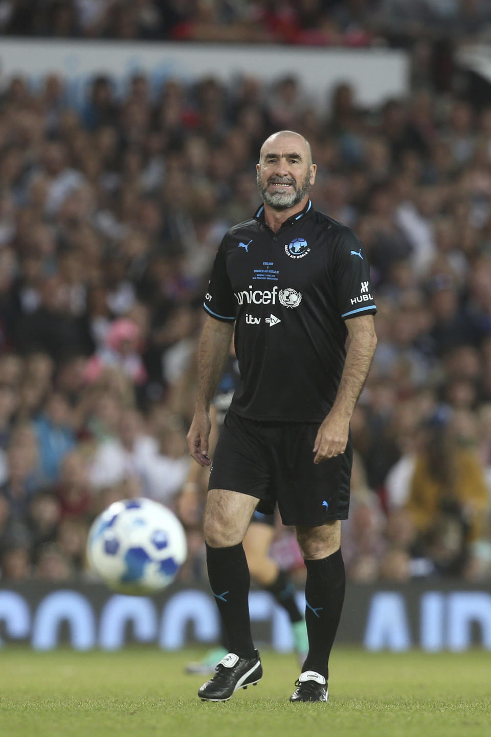 Former footballer Eric Cantona in action on the pitch at Old Trafford as part of Unicef's Soccer Aid, Manchester, Sunday, June 10, 2018. (Photo by Joel C Ryan/Invision/AP)