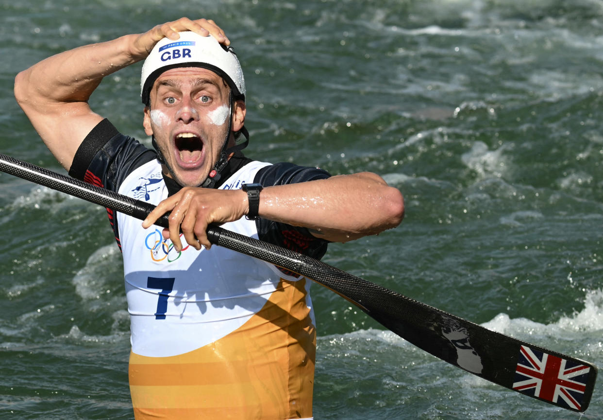 Britain's Adam Burgess celebrates after competing in the men's canoe single final of the canoe slalom competition at Vaires-sur-Marne Nautical Stadium in Vaires-sur-Marne during the Paris 2024 Olympic Games on July 29, 2024. (Photo by Bertrand GUAY / AFP)