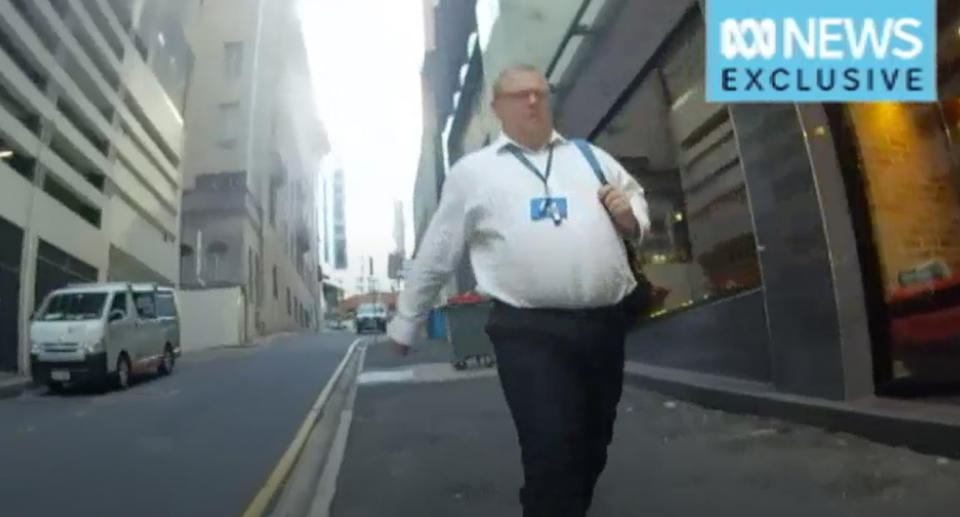 The pedestrian (pictured) before he attacked the cyclist James Stevenson in Brisbane's CBD