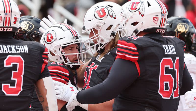 Utah Utes quarterback Luke Bottari (15) celebrates his touchdown against the Colorado Buffaloes in Salt Lake City on Saturday, Nov. 25, 2023. Utah won 23-17.