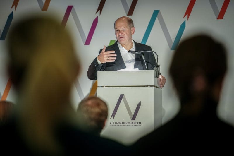 German Chancellor Olaf Scholz speaks at the Alliance of Opportunities network meeting. Currently, 65 companies from 16 sectors have already joined forces to form the Alliance of Opportunities, with the overarching aim of helping people find work. Kay Nietfeld/dpa