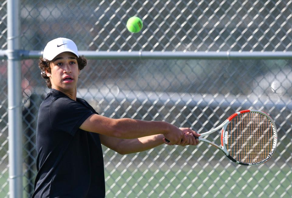 Jonah Atkinson of Tech concentrates on the ball during the match against Monticello Wednesday, May 18, 2022, at Tech High School.