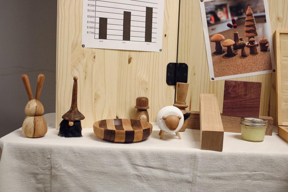 Handcrafted woodwork made by Liam Deniau-Young sits at his booth during the tradeshow portion of the Youth Entrepreneurship Challenge March 1. Deniau-Young was awarded 3rd place at this year's event.