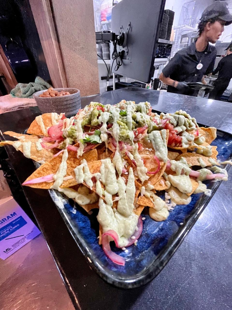 An order of Cape trash can nachos is ready to be served at Tito's Cantina.