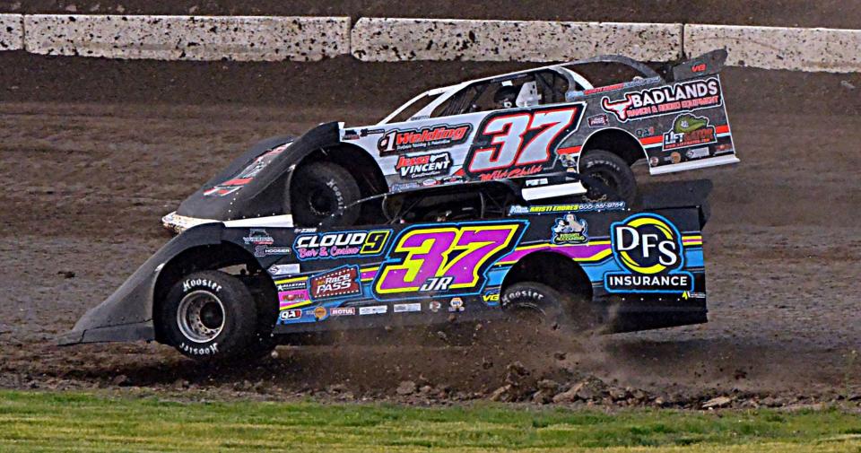 Morgan Ward Grosz of Watertown (37JR) and her father Scott Ward (37) get after it in a late model heat race during the season-opening racing program on Sunday, May 12, 2024 at Casino Speedway in Watertown.