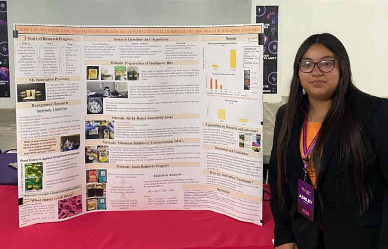 Arizona high schooler Ashley Valencia presenting her project “Novel Oral Treatments Infused with Native Plants Extracts to Improve the Oral Health in Developing Countries” at the National STEM Festival. (Joshua Bay/The 74)