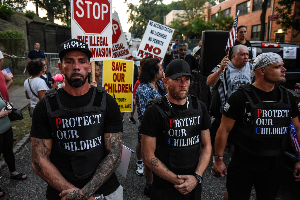 Demonstrators at a rally protest the opening of a temporary shelter for asylum seekers on Staten Island in New York City on Sept. 5.