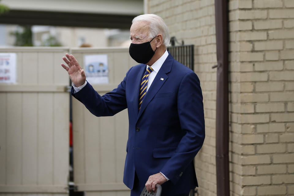 Democratic presidential candidate, former Vice President Joe Biden waves as he arrives to meet with with small business owners, Wednesday, June 17, 2020, at Carlette's Hideaway, a soul food restaurant, in Yeadon, Pa. (AP Photo/Matt Slocum)