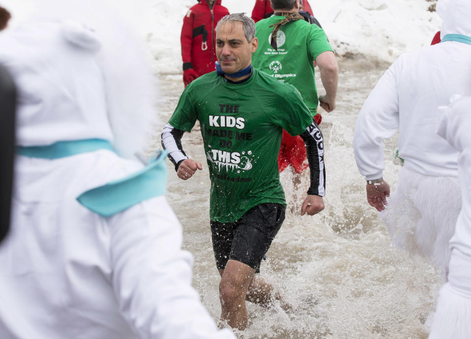 Chicago Mayor Rahm Emanuel exits the water during the Chicago Polar Plunge, Sunday, March 2, 2014, in Chicago. Emanuel joined "The Tonight Show" host Jimmy Fallon in the event. (AP Photo/Andrew A. Nelles)