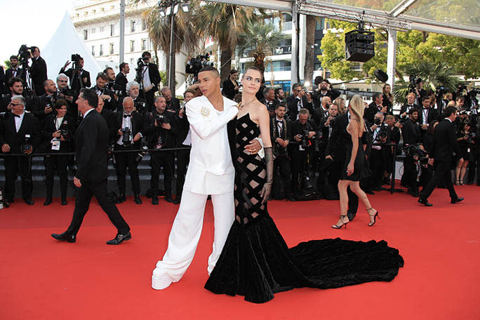 Cara Delevingne and Olivier Rousteing pose together on the red carpet at the premiere of ‘L’innocent’ (The Innocent)” during the 75th annual Cannes Film Festival on May 24, 2022. - Credit: KCS Presse / MEGA