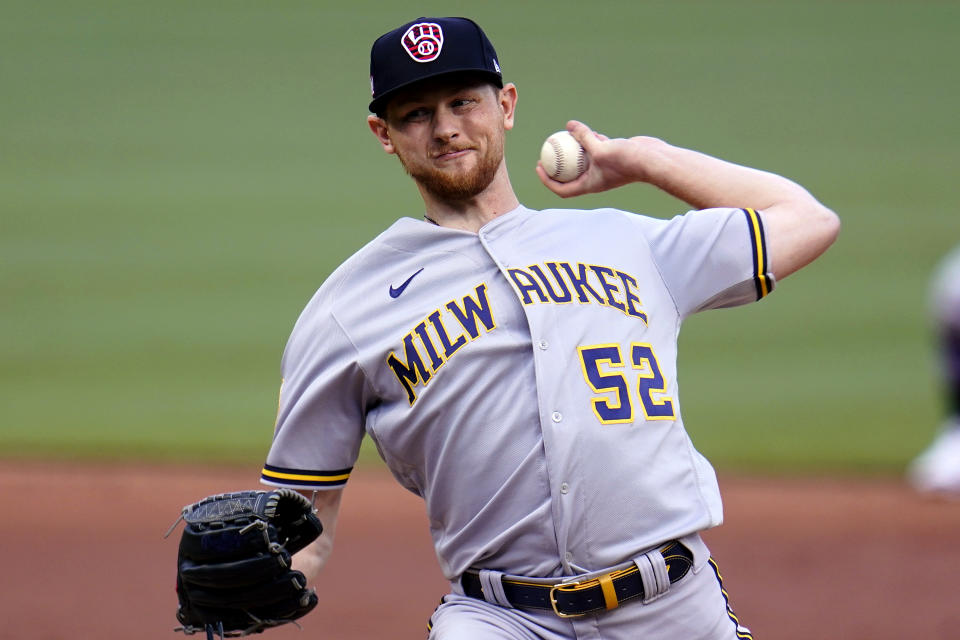 Milwaukee Brewers starting pitcher Eric Lauer delivers during the second inning of the team's baseball game against the Pittsburgh Pirates in Pittsburgh, Saturday, July 3, 2021. (AP Photo/Gene J. Puskar)