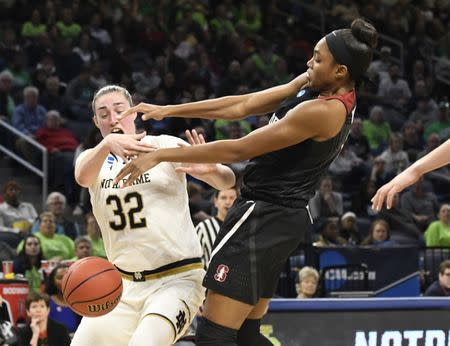 Apr 1, 2019; Chicago, IL, USA; Notre Dame Fighting Irish forward Jessica Shepard (32) is defended by Stanford Cardinal forward Maya Dodson (15) during the second half in the championship game of the Chicago regional in the women's 2019 NCAA Tournament at Wintrust Arena. Mandatory Credit: David Banks-USA TODAY Sports