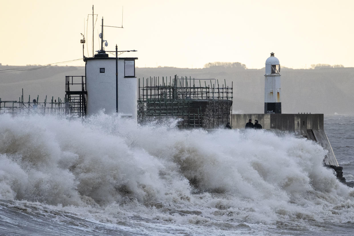 PORTHCAWL, WALES - FEBRUARY 19: Waves crash against the harbour wall on February 19, 2022 in Porthcawl, Wales. Three people were killed and thousands left without power as storm Eunice hit the UK yesterday. Yellow weather warnings for wind have been issued for coastal areas in the South today. (Photo by Matthew Horwood/Getty Images)