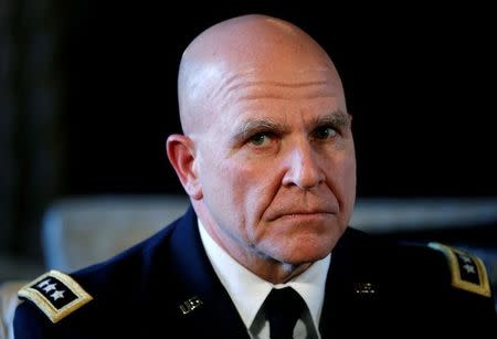 Newly named National Security Adviser Army Lt. Gen. H.R. McMaster listens as U.S. President Donald Trump makes the announcement at his Mar-a-Lago estate in Palm Beach, Florida U.S. February 20, 2017. REUTERS/Kevin Lamarque/Files