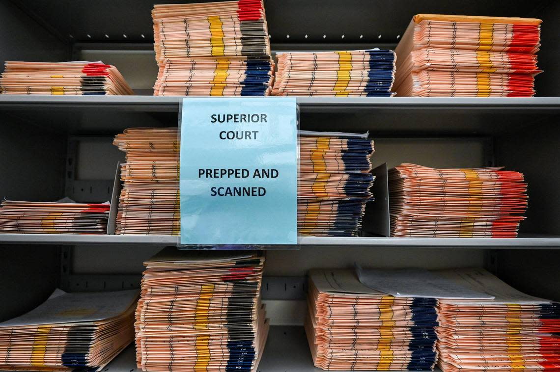 Scanned cases for Superior Court sit on a shelf in the Criminal Division of the The Clerk’s Office on Sept. 21 at the Mecklenburg County Courthouse. After a slew of reported issues, a lawsuit and a delay, eCourts is coming to Mecklenburg County. Lawyers, clerks and other court staff are prepping.