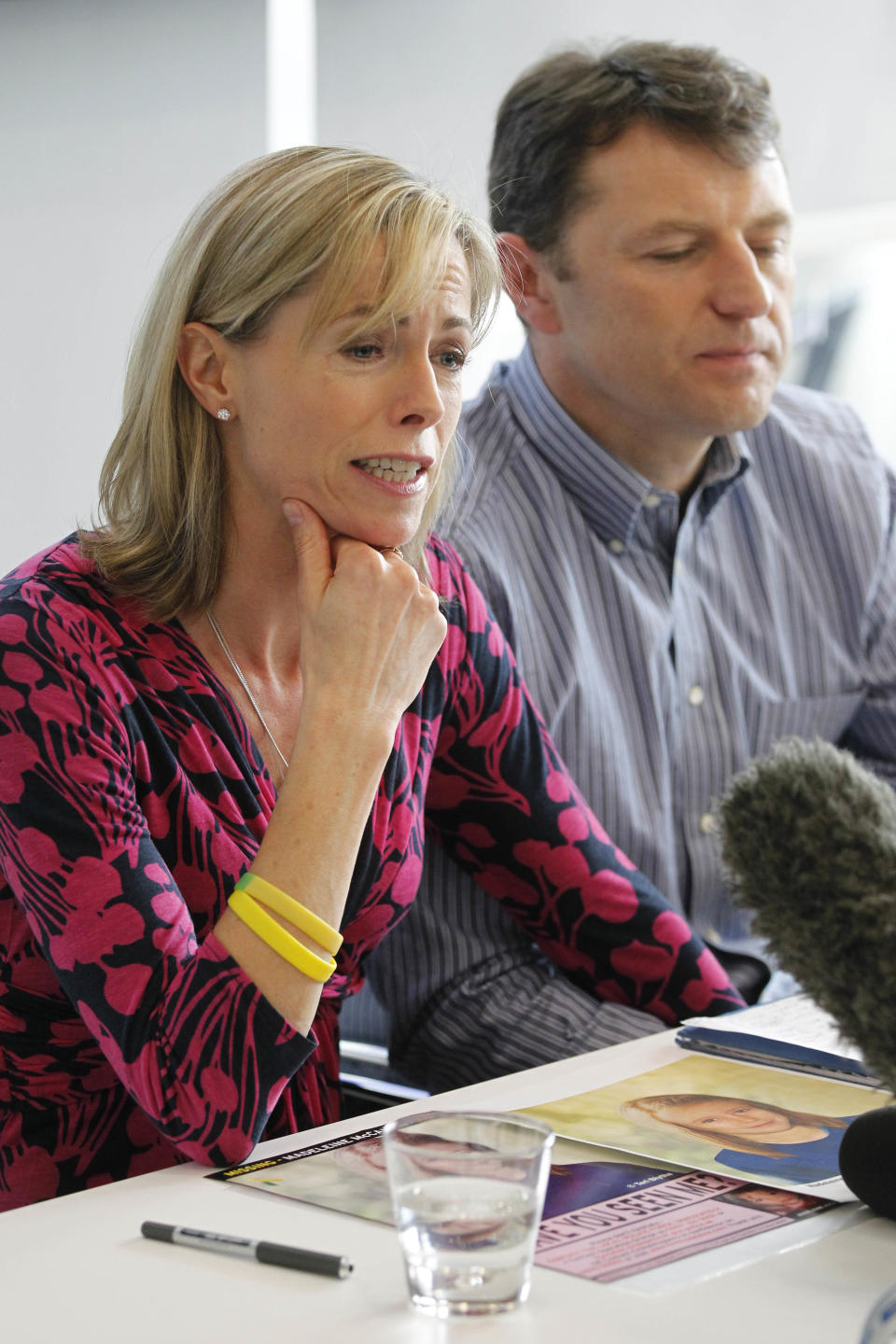 FILE- May 2, 2012 file photo Kate and Gerry McCann talk to reporters in London to mark their daughter Madeleine's birthday and the 5th anniversary of their daughter's disappearance during a family vacation in southern Portugal in May 2007 shortly before her fourth birthday. Lord Justice Brian Leveson will release his report, Thursday Nov. 29 2012, on a year-long inquiry into the culture and practices of the British press and his recommendations for future regulation to prevent phone hacking, data theft, bribery and other abuses. (AP Photo/Sang Tan, File)