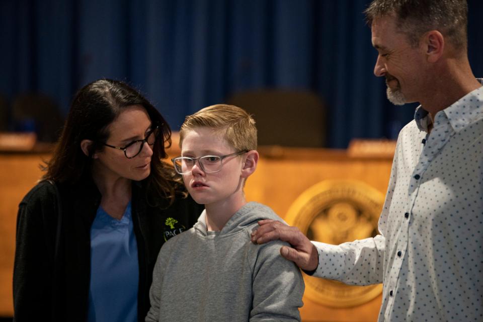 Ireta Reeves, left, mother of Dillon Reeves, 13, a seventh grader at Carter Middle School in Warren, and her husband, Steve Reeves, during a news conference on Thursday, April 27, 2023. Dillon Reeves made a heroic move when he brought his school bus to a safe stop after the driver fell ill and unconscious this week.