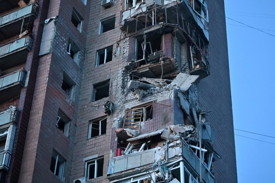 This photograph shows a residential building damaged as a result of a missile attack in Kharkiv (AFP via Getty Images)