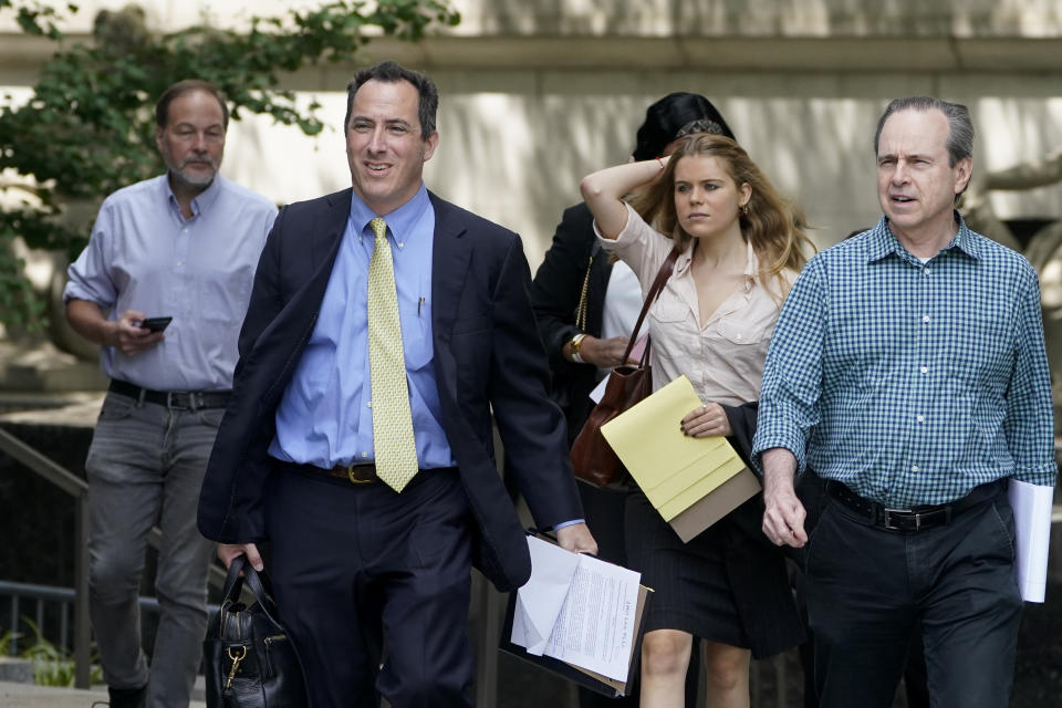 CORRECTS FULL NAME TO ZACHARY MARGULIS-OHNUMA, NOT ZACHARY MARGULIS - Zachary Margulis-Ohnuma, second from left, attorney for retired Maj. Gen. Hugo Carvajal, speaks to reporters after his client entered a not guilty plea at his initial appearance at federal court, Thursday, July 20, 2023, in New York. The former Venezuelan spymaster close to the country's late leader Hugo Chávez was extradited to New York from Spain on Wednesday, July 19, to face decade-old drug trafficking charges. (AP Photo/John Minchillo)