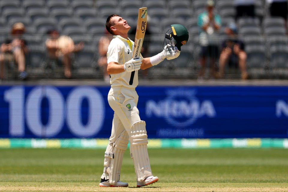 PERTH, AUSTRALIA - DECEMBER 03: Marnus Labuschagne of Australia celebrates his century during day four of the First Test match between Australia and the West Indies at Optus Stadium on December 03, 2022 in Perth, Australia. (Photo by Cameron Spencer/Getty Images)