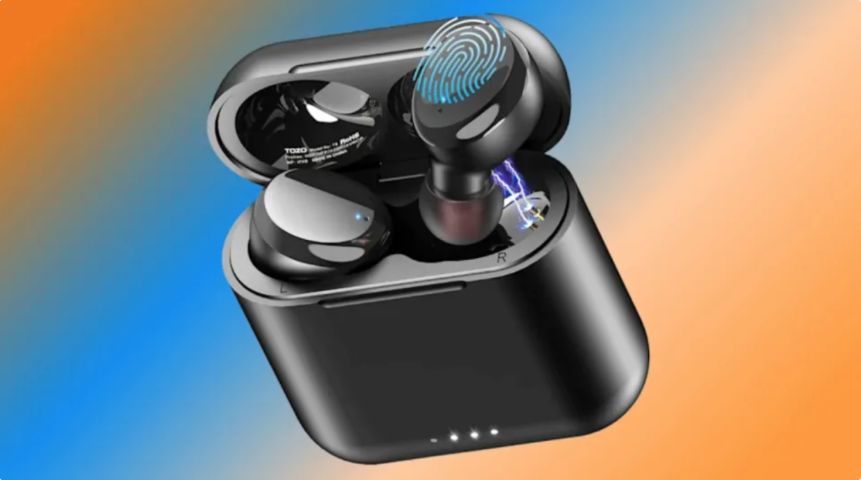 Black wireless earbuds popping out of their black charging case