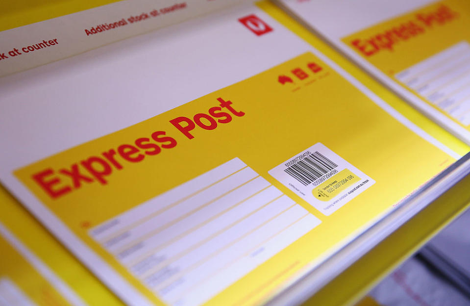 Pictured: Australia Post express post parcel. Image: Getty