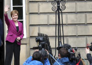 Scotland's First Minister and Scottish National Party leader Nicola Sturgeon poses for photographers, at Bute House in Edinburgh, Scotland. Sunday, May 9, 2021. British Prime Minister Boris Johnson has invited the leaders of the U.K.’s devolved nations for crisis talks on the union after Scotland’s pro-independence party won its fourth straight parliamentary election. Sturgeon said the election results proved a second independence vote for Scotland was “the will of the country." She said any London politician who stood in the way would be “picking a fight with the democratic wishes of the Scottish people.” (AP Photo/Scott Heppell)