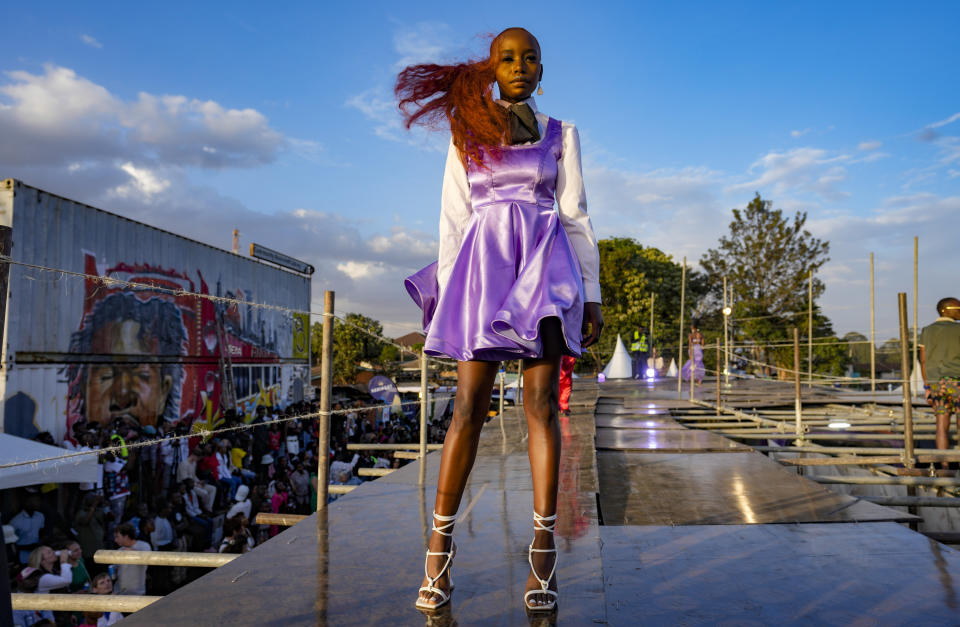 Models in action at the Kibera Fashion Week event in the Kibera slum of Nairobi, Kenya Saturday, Oct. 14, 2023. (AP Photo/Brian Inganga)