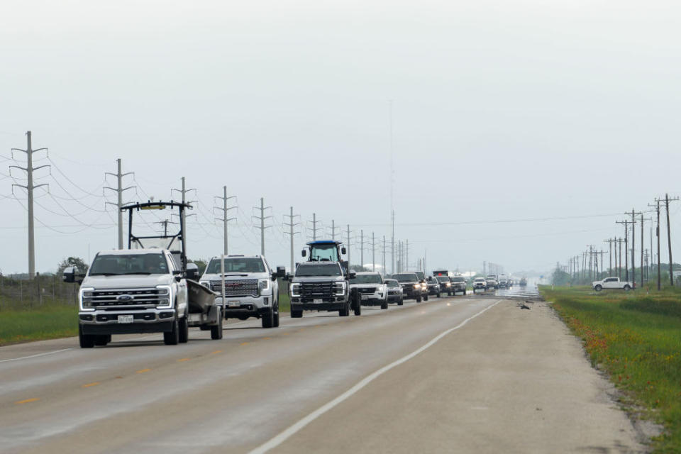 People evacuate and move belongings out ahead of the expected landfall of Tropical Storm Beryl in Texas.