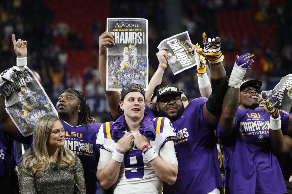 LSU quarterback Joe Burrow (9) is one of many SEC players expected to go in the first round of the NFL draft. (AP Photo/John Bazemore)