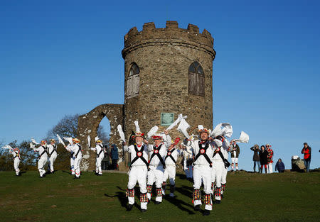 Leicester Morrismen dance during May Day celebrations at Bradgate Park in Newtown Linford, Britain May 1, 2018. REUTERS/Darren Staples