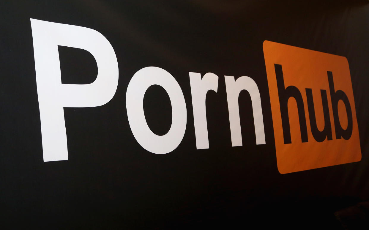 LAS VEGAS, NV - JANUARY 24:  A Pornhub logo is displayed at the company's booth during the 2018 AVN Adult Expo at the Hard Rock Hotel & Casino on January 24, 2018 in Las Vegas, Nevada.  (Photo by Gabe Ginsberg/FilmMagic)