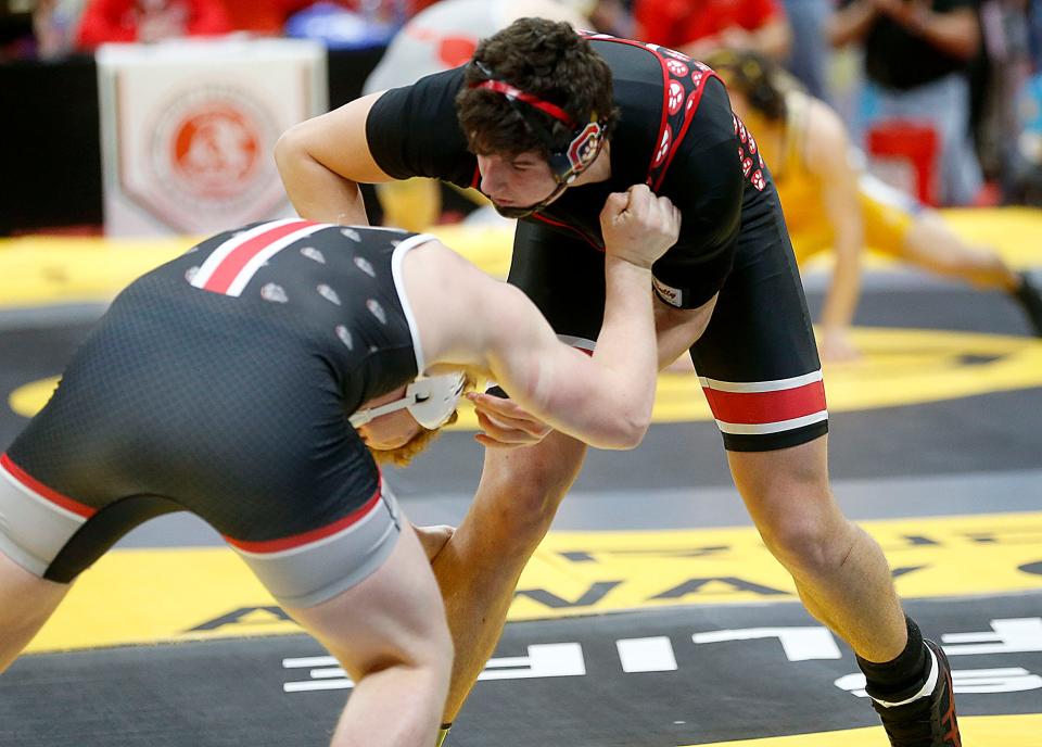 Crestview's Caleb Cunningham wrestles Columbus Groves' A.J. Schafer during their 215 lbs. match at the OHSAA State Wrestling Championships Friday, March 10, 2023 at the Jerome Schottenstein Center. TOM E. PUSKAR/ASHLAND TIMES-GAZETTE