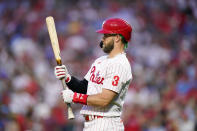 Philadelphia Phillies' Bryce Harper prepares to bat during the first inning of a baseball game against the Pittsburgh Pirates, Friday, Aug. 26, 2022, in Philadelphia. (AP Photo/Matt Slocum)