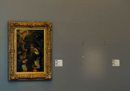 FILE PHOTO: An empty spot on the wall marks the place where the stolen Henri Matisse painting was in Rotterdam's Kunsthal art gallery in the Netherlands October 16, 2012. REUTERS/Robin van Lonkhuijsen/File Photo