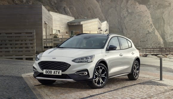 A white 2019 Ford Focus Active with British license plates.